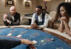baccarat players at casino table