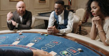 baccarat players at casino table