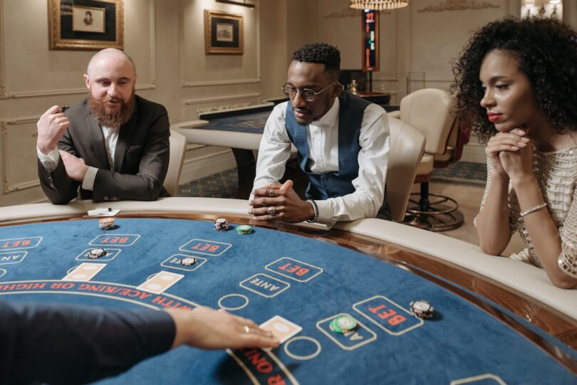 baccarat players at casino table
